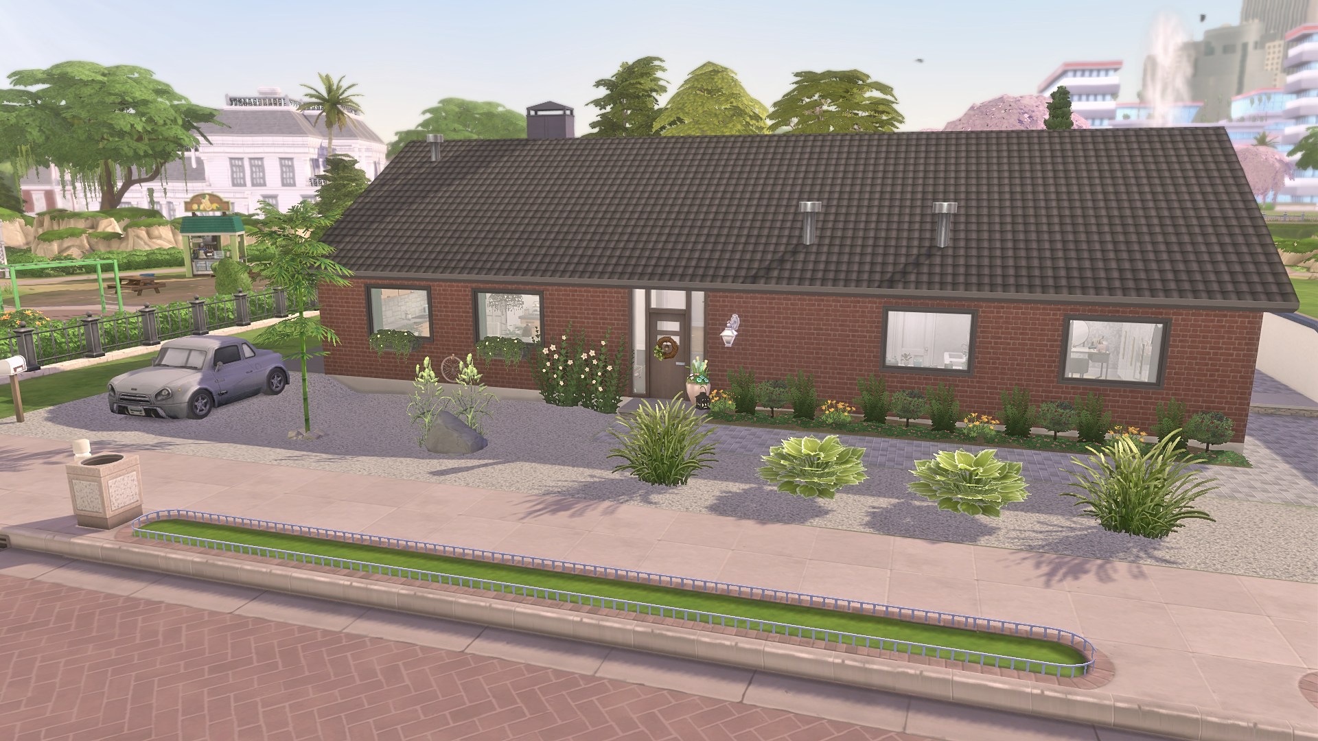 A charming brick home featuring a large glass sunroom in the picturesque village of Åsljunga, in southern Sweden